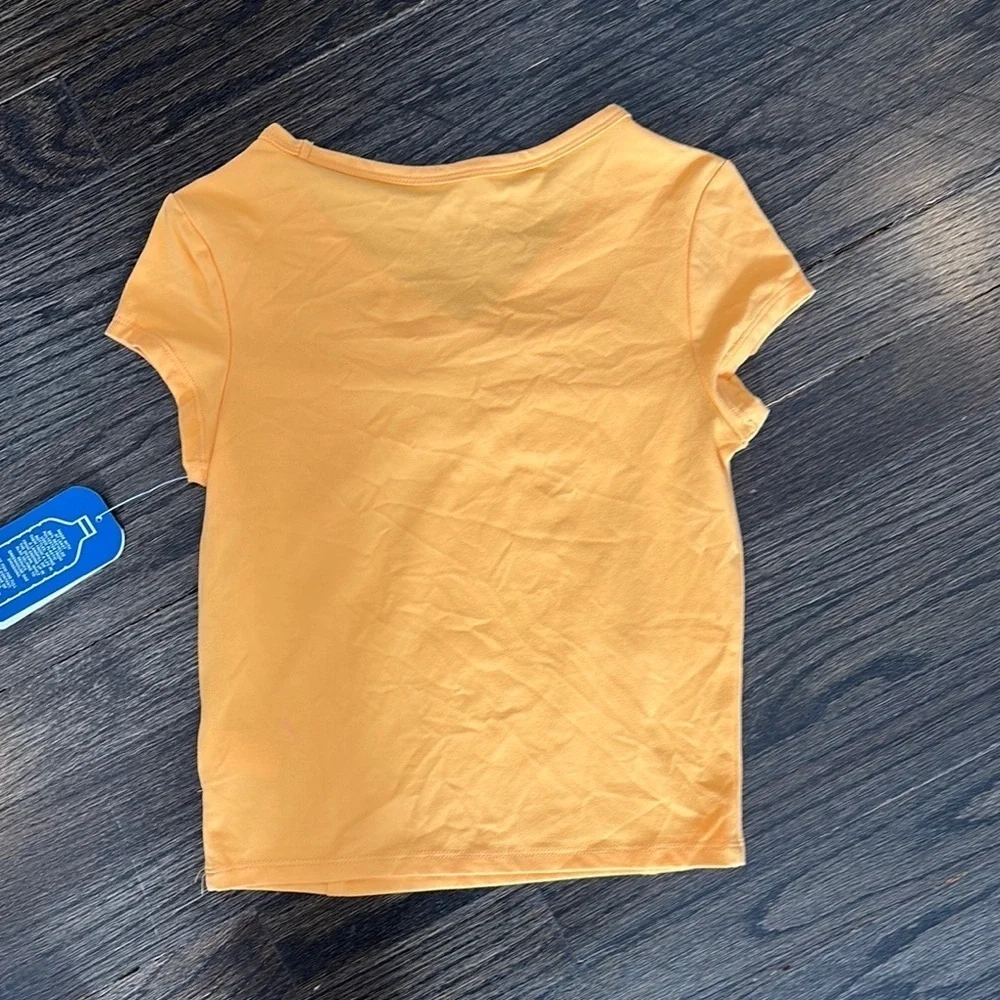 NWT MTA Sport Kid’s Orange Top size (7/8)